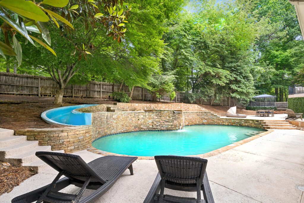 North Atlanta home with a swimming pool and outdoor living area